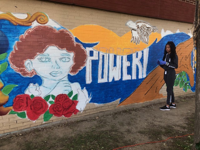 Working on the mural